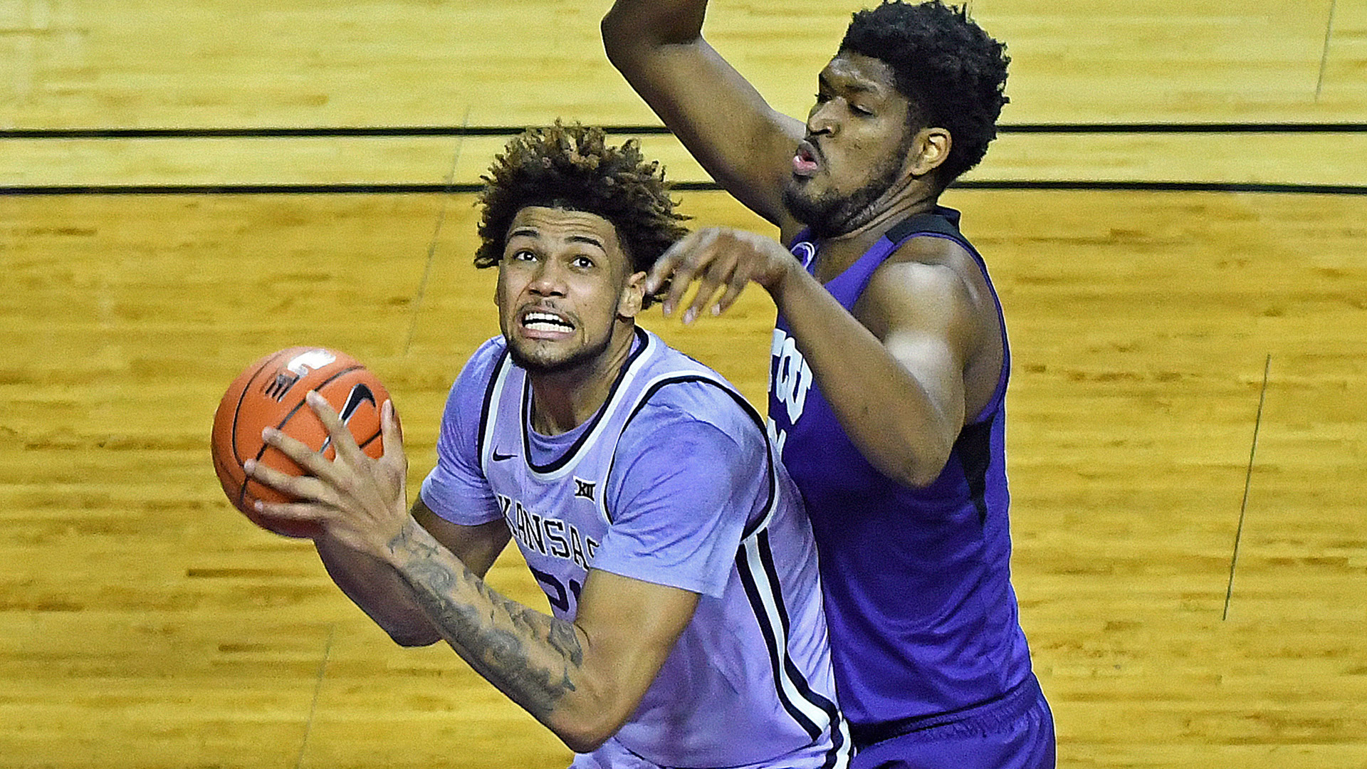Huggins sees future potential in Kansas State's young roster, as No. 14 West Virginia prepares to face Wildcats